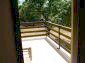 nice big verandah viewing the garden of the property