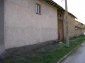 The road and part of the house