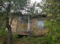 14318:3 - Bulgarian property a house, a garage, garden 6000sq.m near lake