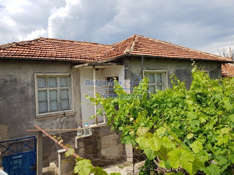 13422:1 - Two houses and garden 3000 sq.m in a village 50 km from Plovdiv
