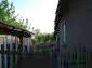 11023:15 - Pretty small rural house with plenty of fruit trees in the yard