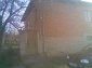11044:5 - Pretty brick house with a garden featuring many fruit trees