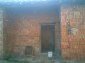 11044:14 - Pretty brick house with a garden featuring many fruit trees