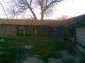 11044:9 - Pretty brick house with a garden featuring many fruit trees