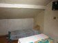 11077:14 - Small Bulgarian house in an incredible hilly countryside