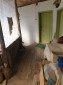 13005:4 - An old house in nice design and many outbuildings near Popovo