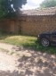 13005:12 - An old house in nice design and many outbuildings near Popovo