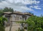 13438:58 - Solid house for sale with a large yard , only 18km by the sea